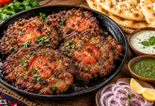 Chapli Kabab Recipe: Authentic Peshawari Style Peshawari chapli kabab recipe with crispy beef kababs, tomato slices, naan and chutney